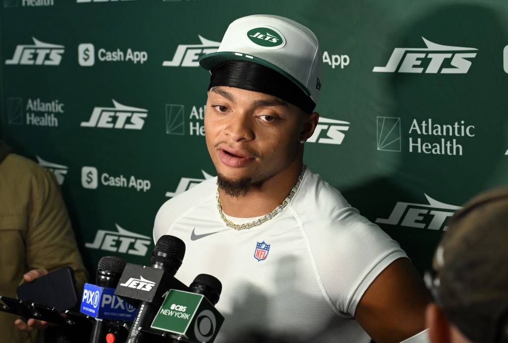 Justin Fields talks to the media after Jets' practice on Oct. 22, 2025.