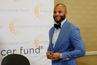 Dallas Cowboys quarterback Dak Prescott talks with reporters before the Children's Cancer...