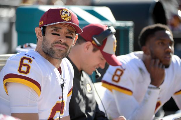 FILE – Washington Redskins quarterback Mark Sanchez (6) watches from...