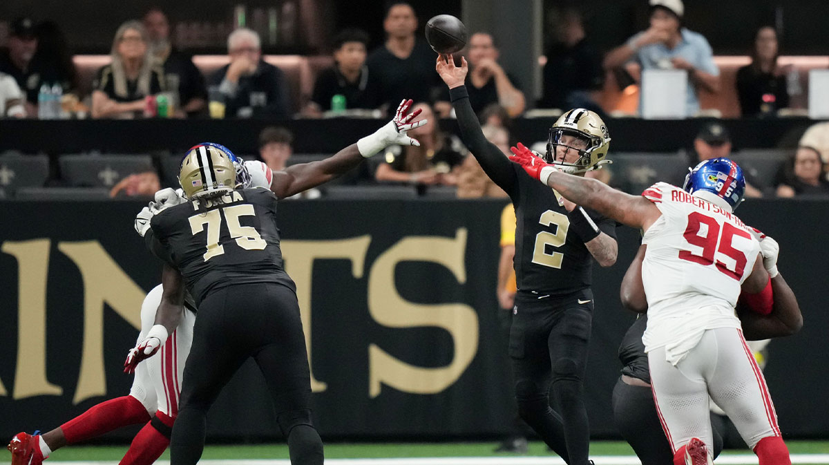 New Orleans Saints quarterback Spencer Rattler (2) passes the ball against the New York Giants during the second quarter at Caesars Superdome.