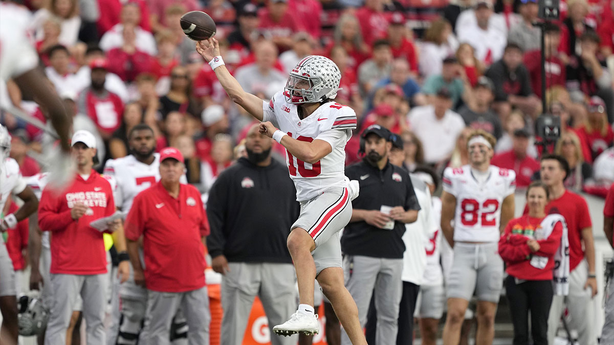 Ohio State Buckeyes quarterback Julian Sayin (10) throws a pass against the Wisconsin Badgers in the second half at Camp Randall Stadium.