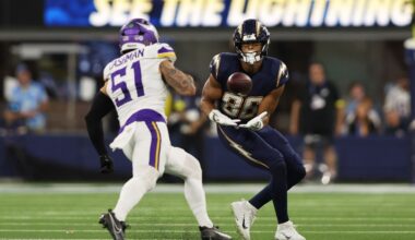 Los Angeles Chargers tight end Oronde Gadsden II (86) catches a pass ahead of Minnesota Vikings linebacker Blake Cashman (51) during the first half of an NFL football game Thursday, Oct. 23, 2025, in Inglewood, Calif. (AP Photo/Jessie Alcheh)