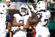 Dallas Cowboys wide receiver George Pickens (3) celebrates his third quarter touchdown catch...