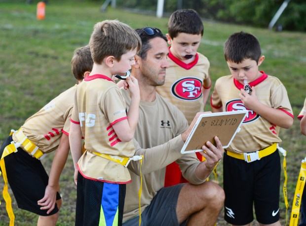 49ers coach Nick Bublavi dials up another winning play. (Photo...