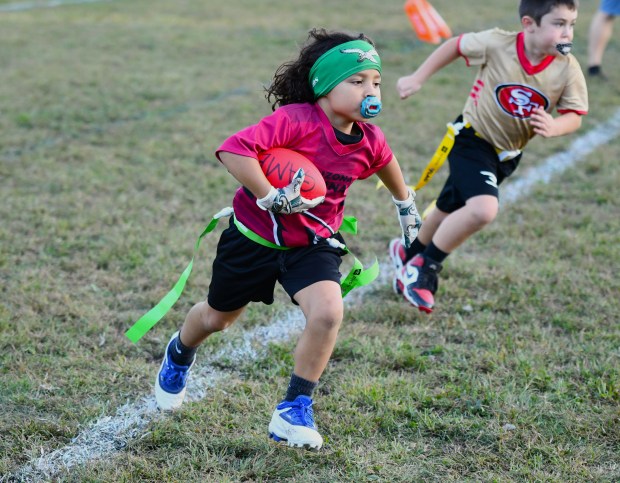 Cardinals Lennox Bradley finds lots of running room around the...