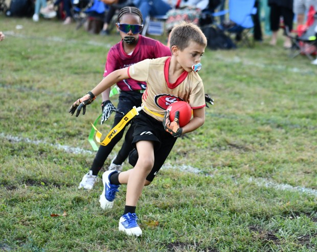 49ers Jason DiBenedetto heads into the end zone after catching...