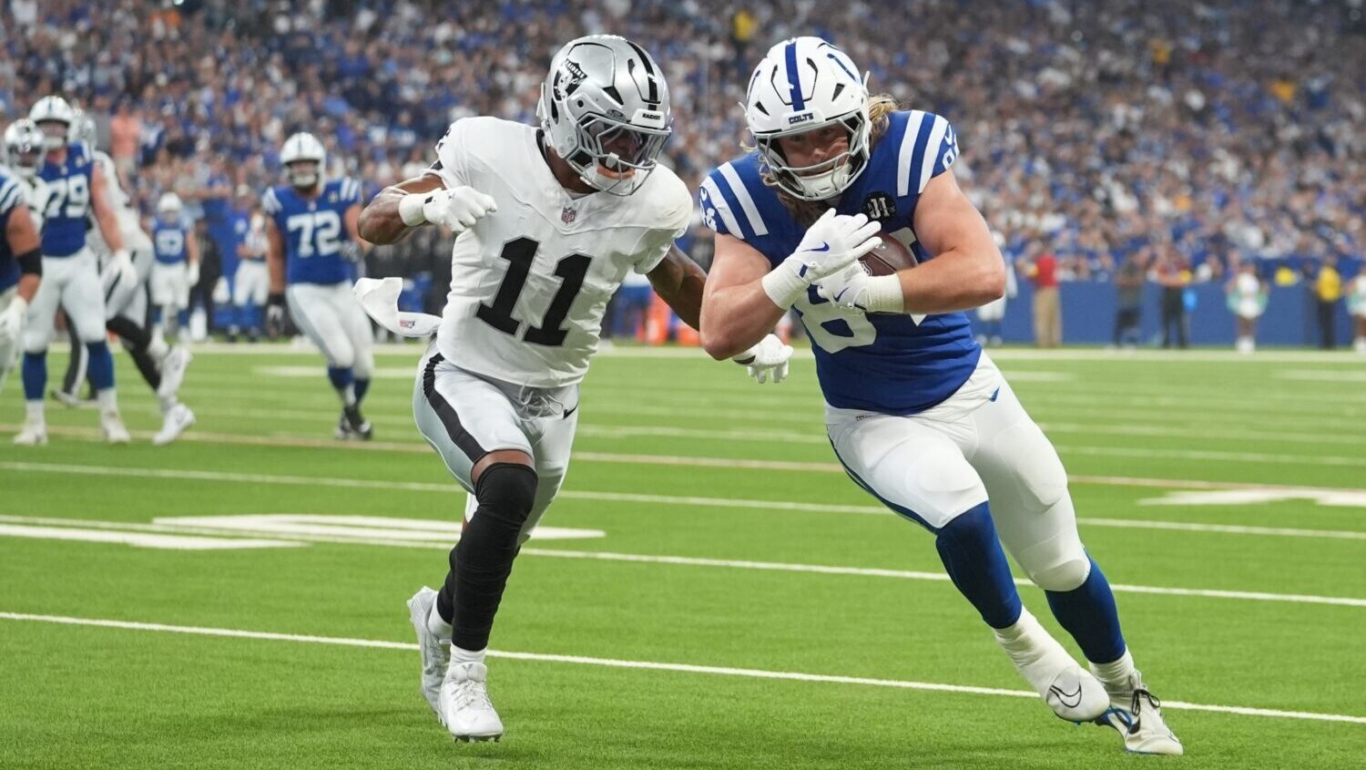 Indianapolis Colts tight end Tyler Warren (84) goes in for a touchdown against Las Vegas Raiders sa...