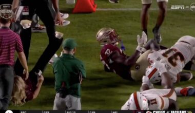 Holly Rowe takes sideline hit, immediately pops up to report on it