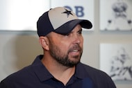 Dallas Cowboys offensive coordinator Klayton Adams responds to questions during an NFL...