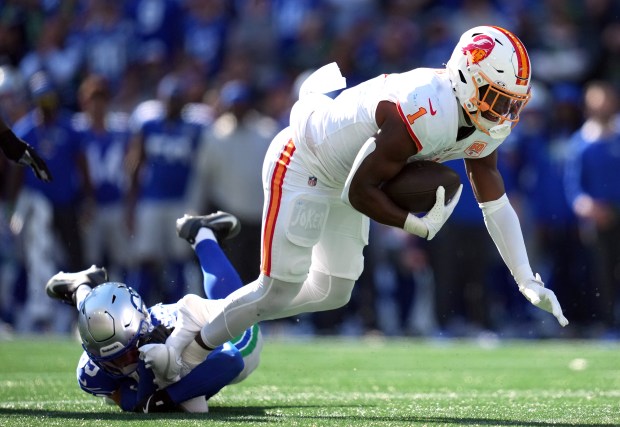 Rachaad White #1 of the Tampa Bay Buccaneers is tackled by Josh Jobe #29 of the Seattle Seahawks during the second quarter at Lumen Field on Oct. 05, 2025 in Seattle, Washington. (Photo by Soobum Im/Getty Images)