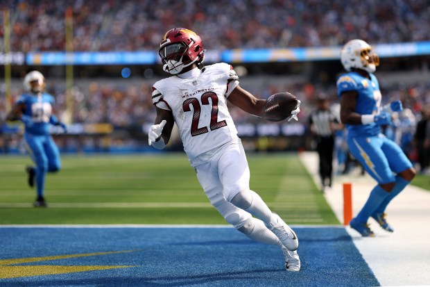Jacory Croskey-Merritt #22 of the Washington Commanders scores a touchdown against the Los Angeles Chargers at SoFi Stadium on Oct. 05, 2025 in Inglewood, California. (Photo by Luke Hales/Getty Images)