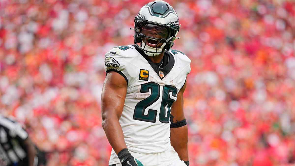 Philadelphia Eagles running back Saquon Barkley (26) celebrates after quarterback Jalen Hurts (not pictured) scored a touchdown against the Kansas City Chiefs during the fourth quarter of the game at GEHA Field at Arrowhead Stadium.