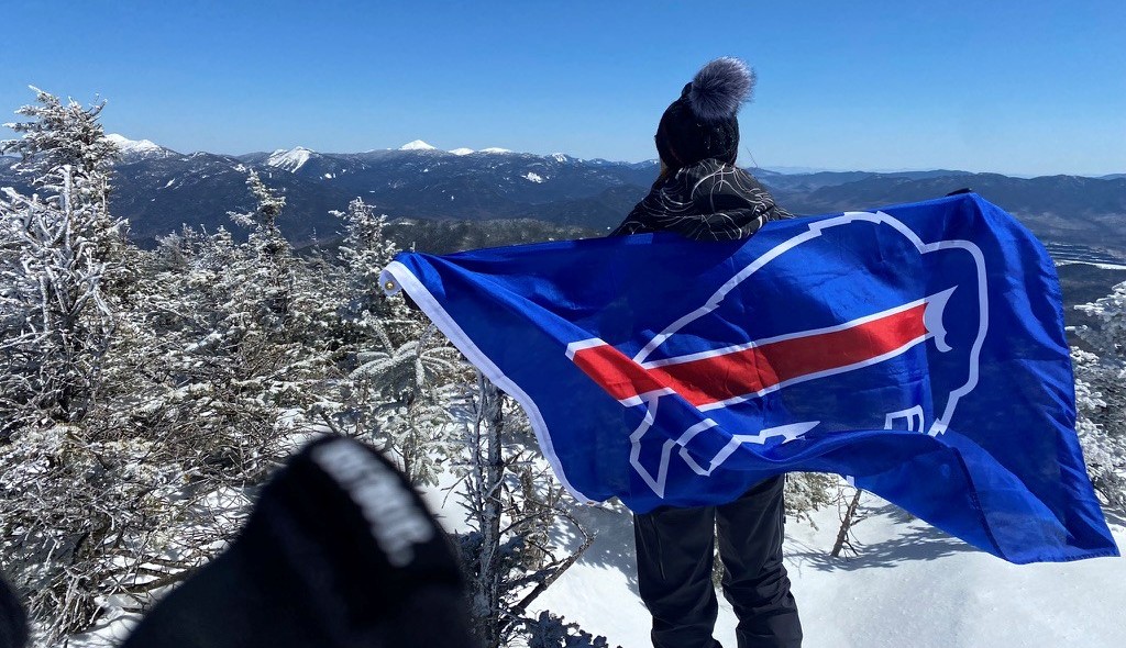 Yoga Instructor Becomes Adirondack 46er, Flies Buffalo Bills Flag on Every Summit