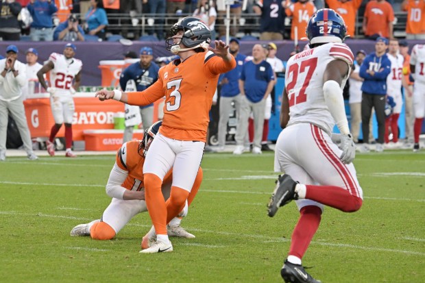 Denver Broncos Will Lutz (3) watches his winning field goal...