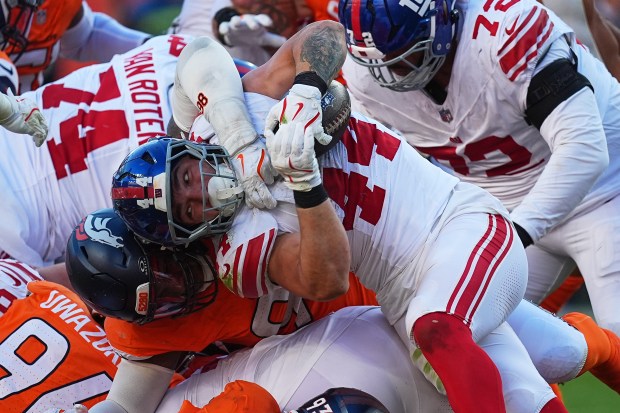 New York Giants running back Cam Skattebo (44) runs against...