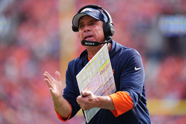 Denver Broncos head coach Sean Payton gestures during the first...