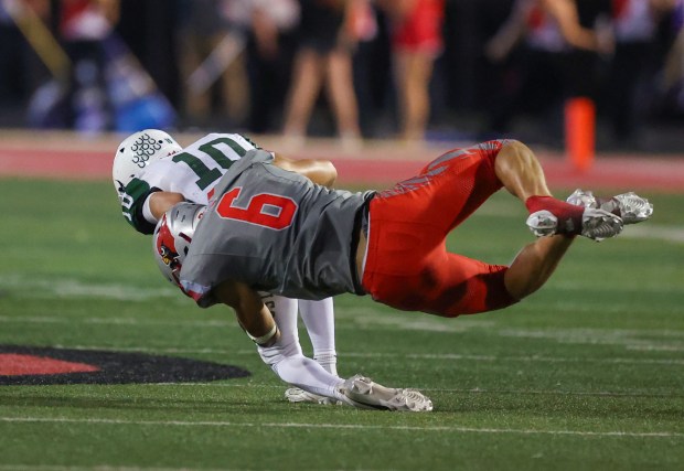 Mentor's Carson Wolk makes a tackle Oct. 3 against Strongsville. (Tim Phillis - for The News-Herald)
