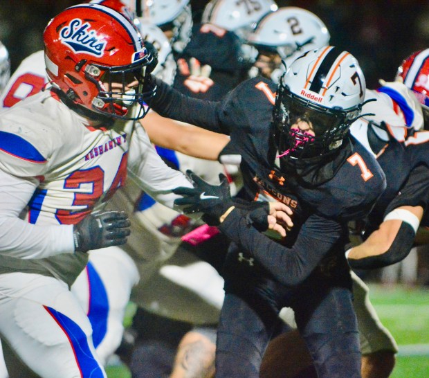 Pennsbury wide receiver Aiden Kitchenman, right, blocks against Neshaminy linebacker...
