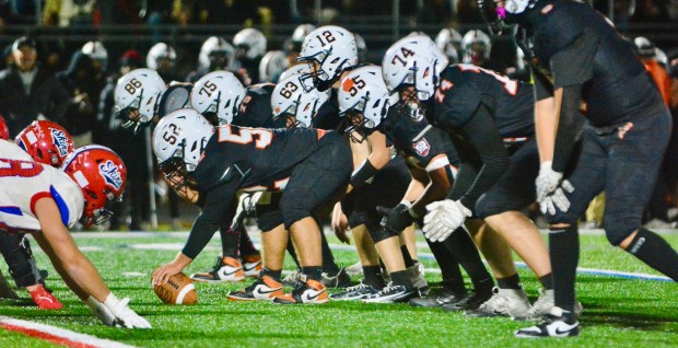 Pennsbury quarterback Jack Arndt, 12, gets under center to take...