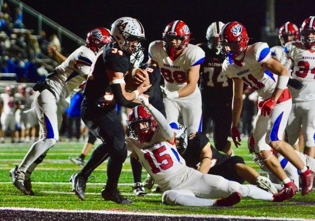 Pennsbury running back Luke Beighley, 34, breaks away from Neshaminy...