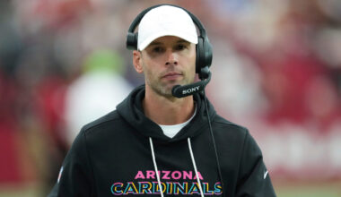 Arizona Cardinals head coach Jonathan Gannon walks the sideline during the first half of an NFL foo...