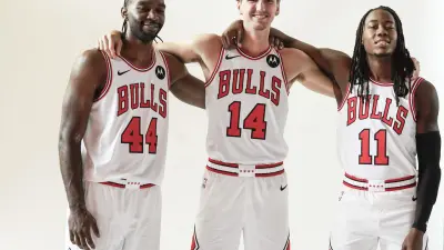 Sep 29, 2025; Chicago, IL, USA; Chicago Bulls forward Patrick Williams (44) forward Matas Buzelis (14) and guard Ayo Dosunmu (11) pose for photos during Chicago Bulls Media Day.
