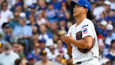 Oct 1, 2025; Chicago, Illinois, USA; Chicago Cubs relief pitcher Shota Imanaga (18) reacts after giving up a two-run home run in the fifth inning against the San Diego Padres during game two of the Wildcard round for the 2025 MLB playoffs at Wrigley Field.