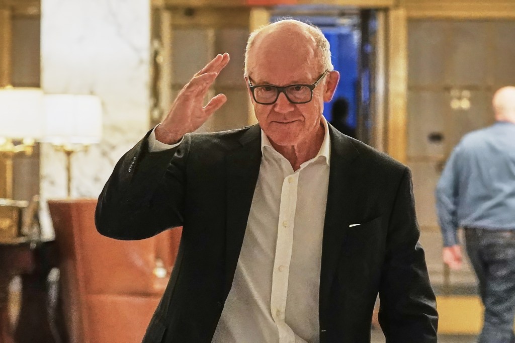 Jets owner Woody Johnson give a wave as he arrives at the NFL meetings on Oct. 22, 2025.
