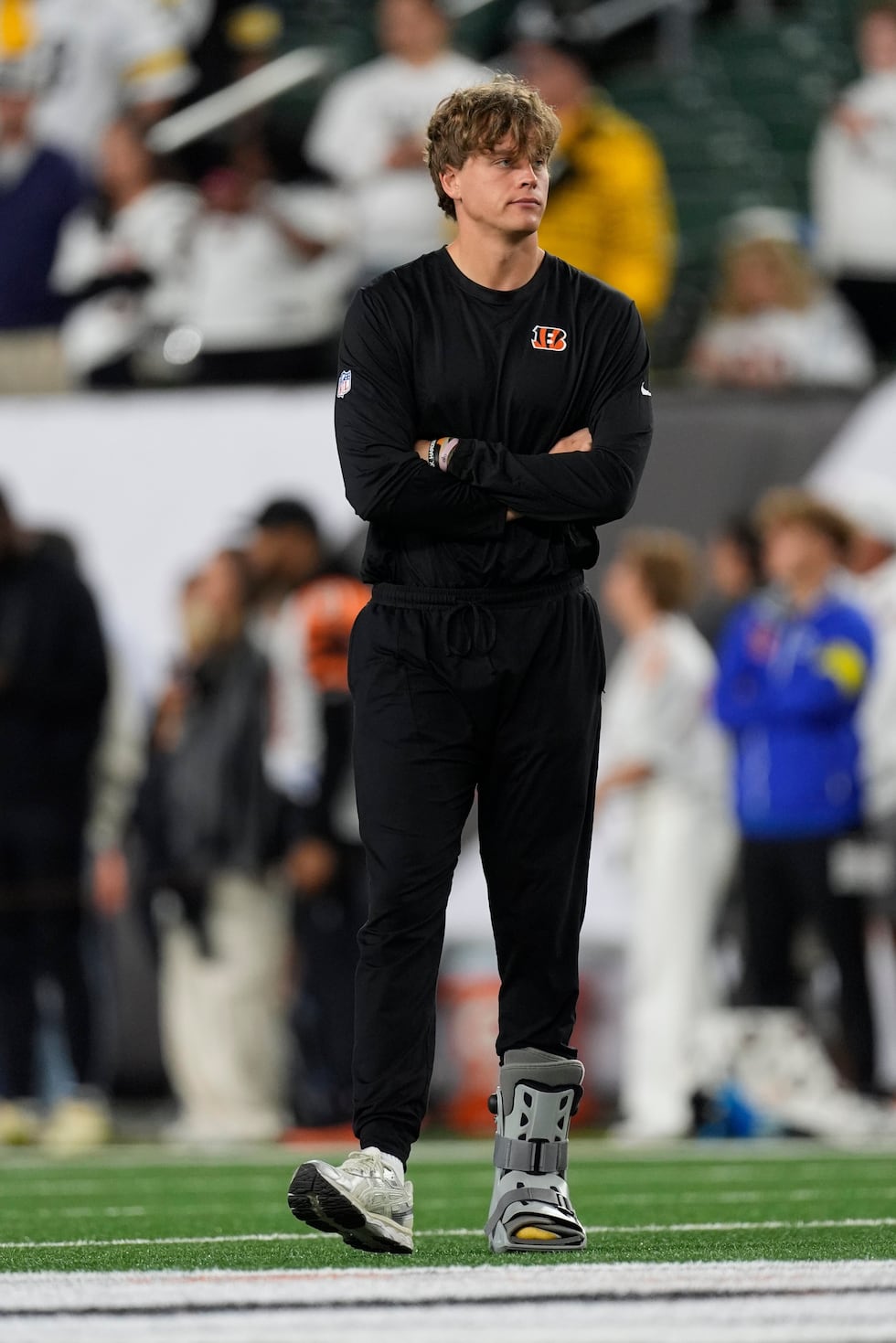 Cincinnati Bengals quarterback Joe Burrows walks on the field during warm ups before an NFL...