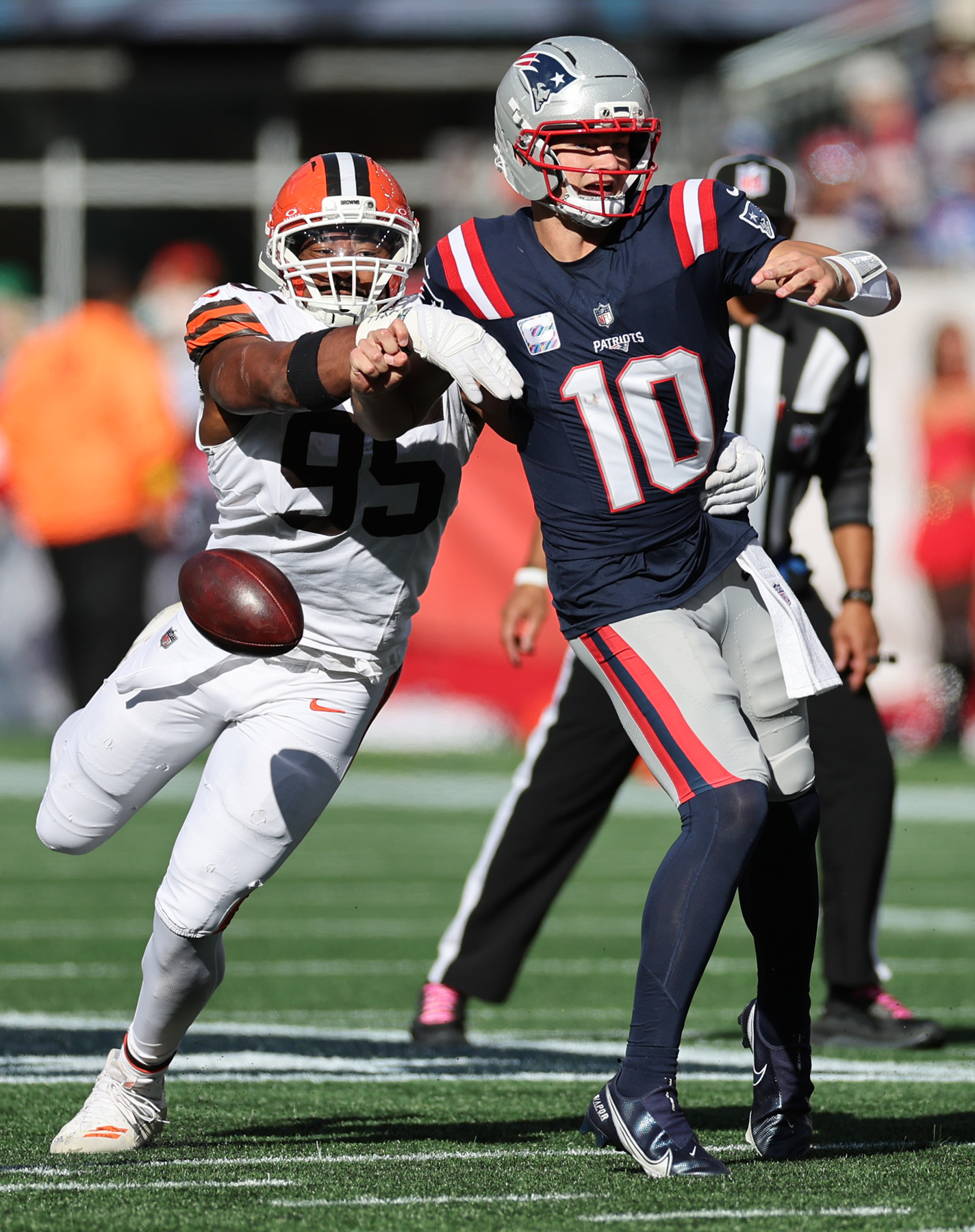 Cleveland Browns defensive end Myles Garrett strip sacks New England Patriots quarterback Drake Maye that was recovered by the New England Patriots in the second quarter. 