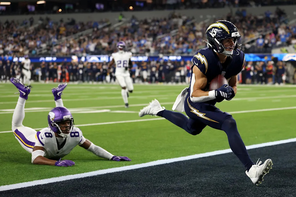 Ladd McConkey of the Los Angeles Chargers scores a touchdown.