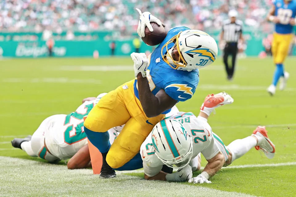 Chargers running back Kimani Vidal scores a touchdown in the third quarter Sunday against the Dolphins.