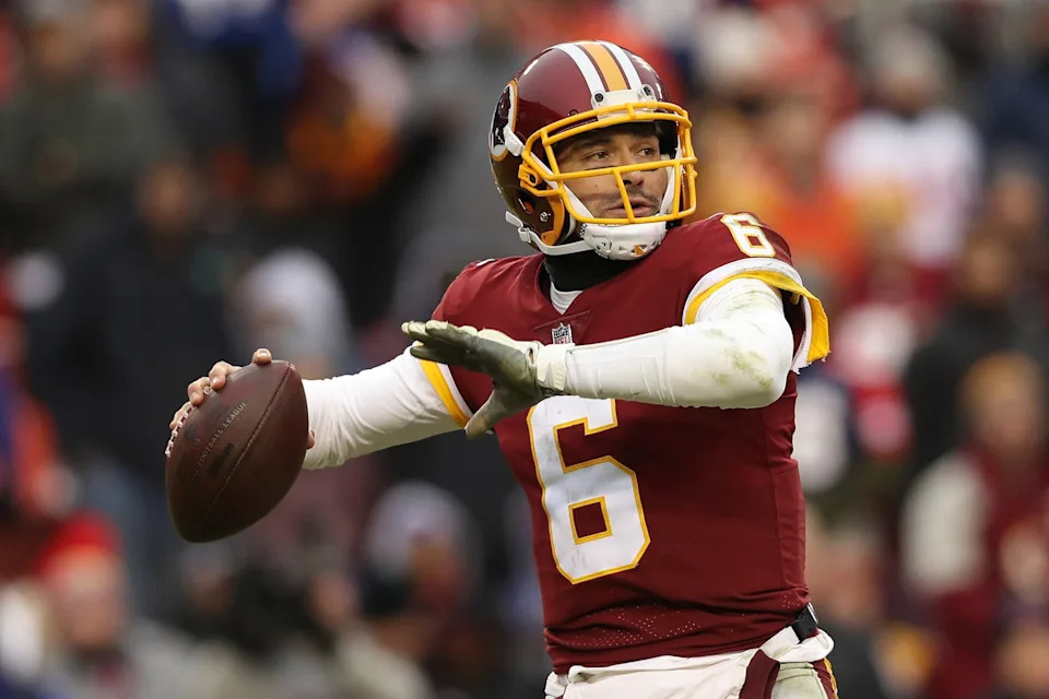 Patrick Smith/Getty Images, FILE - PHOTO: In this Dec. 9, 2018, file photo, quarterback Mark Sanchez of the Washington Commanders throws a pass against the New York Giants at FedExField in Landover, Maryland.