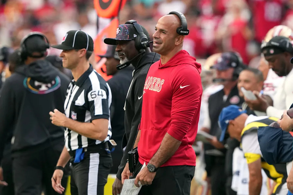 Sep 28, 2025; Santa Clara, California, USA; San Francisco 49ers defensive coordinator Robert Saleh (in red) reacts to a penalty during the third quarter against the Jacksonville Jaguars at Levi's Stadium. Credit: Darren Yamashita-Imagn Images