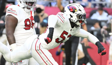 Cardinals pass rusher Baron Browning celebrates after a sack...