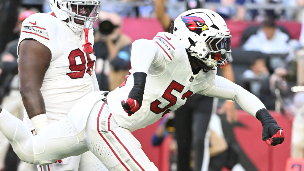 Cardinals pass rusher Baron Browning celebrates after a sack...