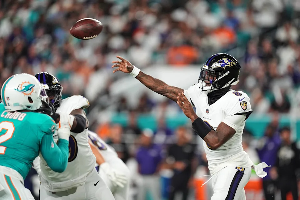 Baltimore Ravens quarterback Lamar Jackson (8) throws against the Miami Dolphins during the first half of an NFL football game, Thursday, Oct. 30, 2025, in Miami Gardens, Fla. (AP Photo/Rebecca Blackwell)