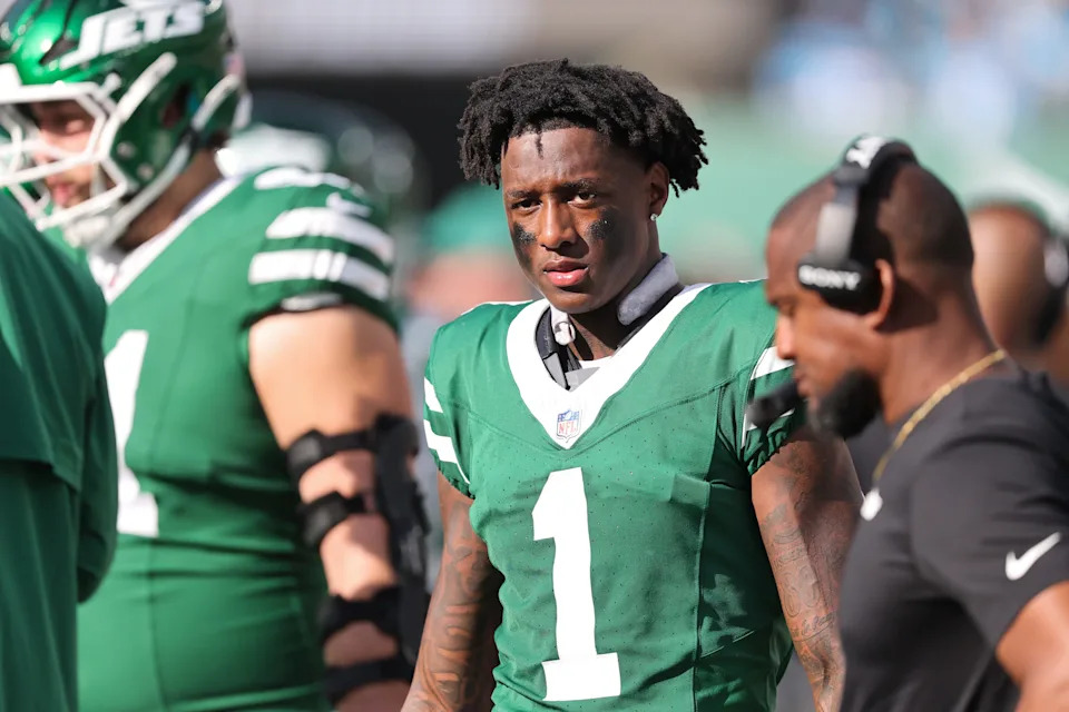 Oct 19, 2025; East Rutherford, New Jersey, USA; New York Jets cornerback Sauce Gardner (1) looks on from the sidelines during the third quarter against the Carolina Panthers at MetLife Stadium. Mandatory Credit: Vincent Carchietta-Imagn Images
