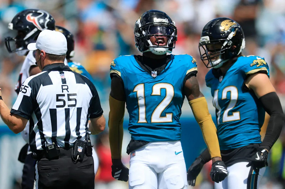 Jacksonville Jaguars wide receiver Travis Hunter (12) reacts to a tackle during the second quarter of an NFL football matchup at EverBank Stadium, Sunday, Sept. 21, 2025, in Jacksonville, Fla. The Jaguars defeated the Texans 17-10. The Jaguars defeated the Texans 17-10.