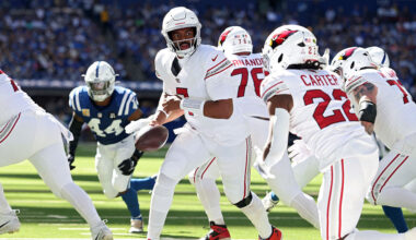 Cardinals' Jacoby Brissett looks to hand off...