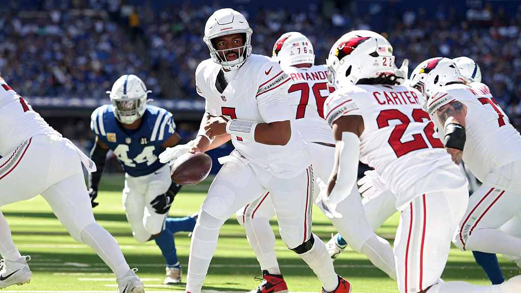 Cardinals' Jacoby Brissett looks to hand off...