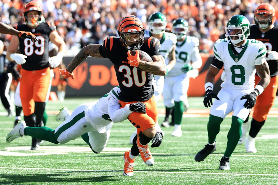 CINCINNATI, OHIO - OCTOBER 26: Chase Brown #30 of the Cincinnati Bengals carries the ball against the New York Jets during the first quarter in the game at Paycor Stadium on October 26, 2025 in Cincinnati, Ohio. (Photo by Justin Casterline/Getty Images)