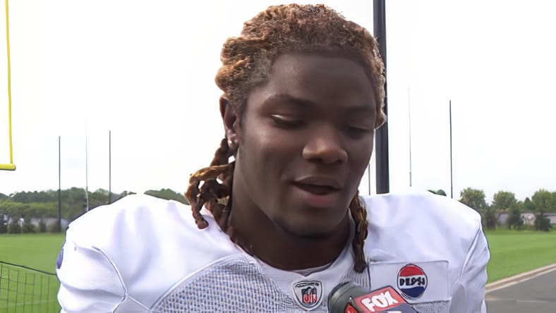 Lewis Cine chats with a reporter during Vikings training camp. worst vikings draft picks ever