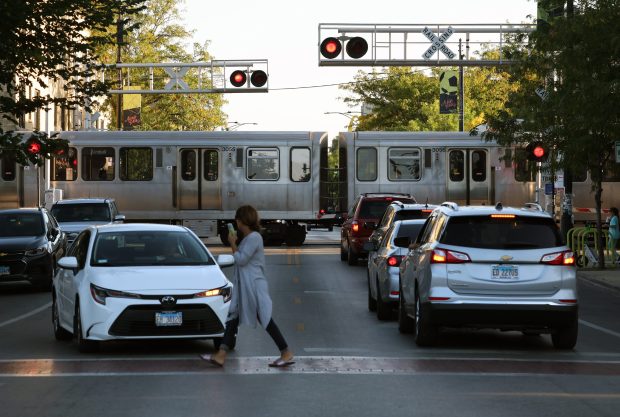 A Chicago Transit Authority Brown Line train crosses Kedzie Avenue near Leland Avenue in Chicago on Sept. 15, 2025. (Terrence Antonio James/Chicago Tribune)