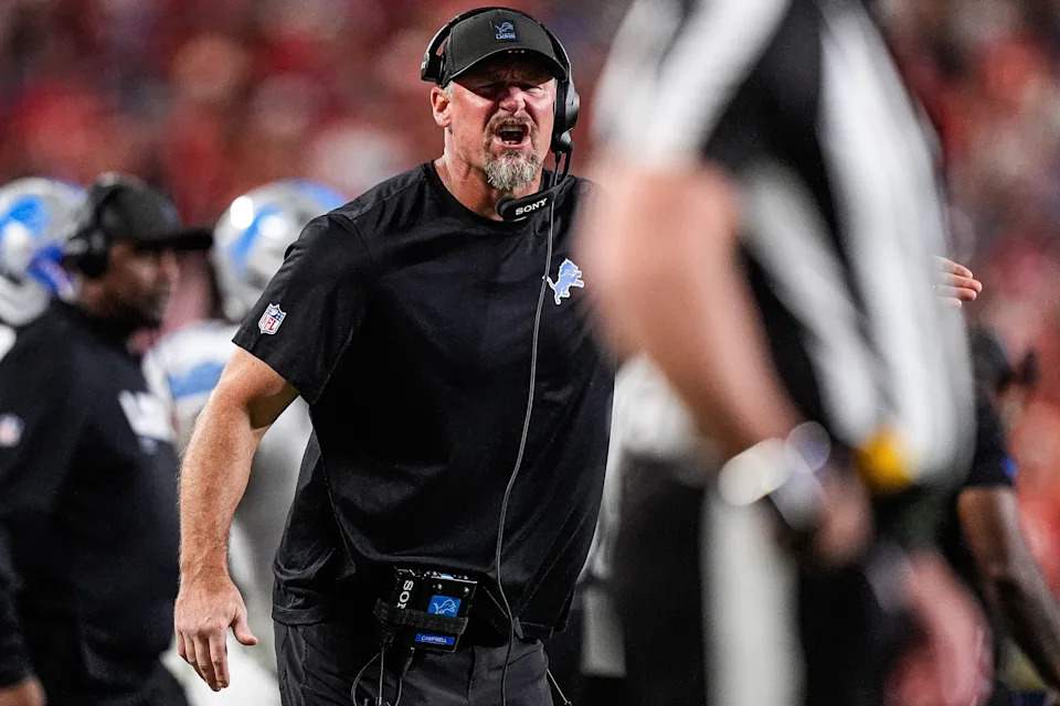 Detroit Lions head coach Dan Campbell talks to a referee before a play against Kansas City Chiefs.
