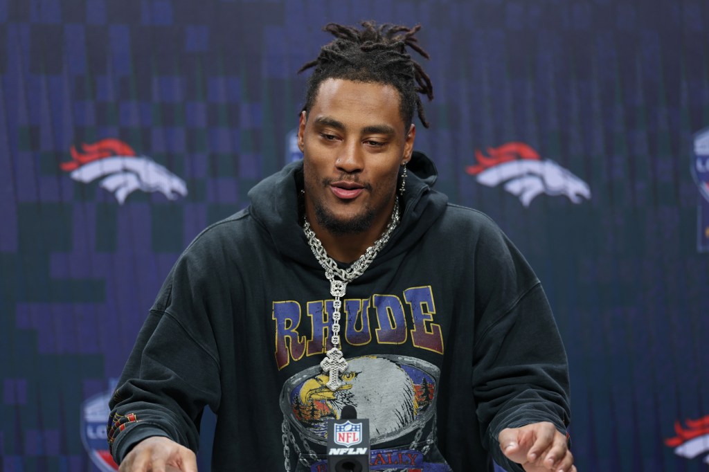 Denver Broncos linebacker Nik Bonitto responds to a question during a news conference after defeating the New York Jets in an NFL football game Sunday, Oct. 12, 2025, in London. 