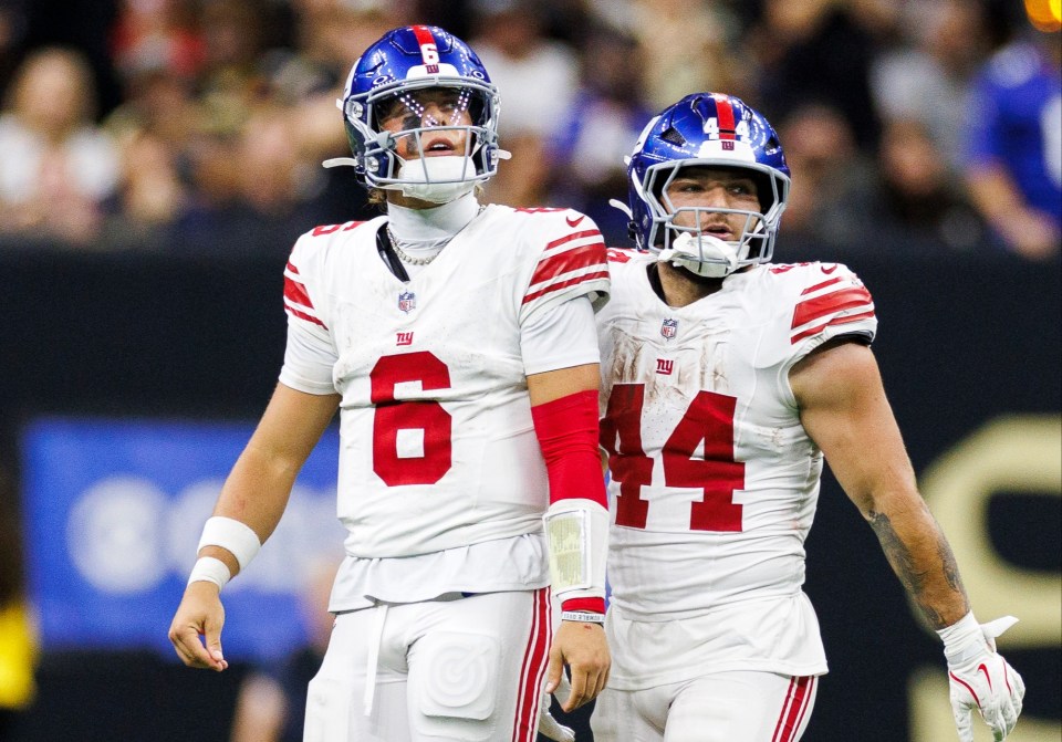 NEW ORLEANS, LOUISIANA - OCTOBER 5: Jaxson Dart #6 and Cam Skattebo #44 of the New York Giants look on during the second quarter of an NFL football game against the New Orleans Saints at Caesars Superdome on October 5, 2025 in New Orleans, Louisiana. (Photo by Logan Bowles/Getty Images)