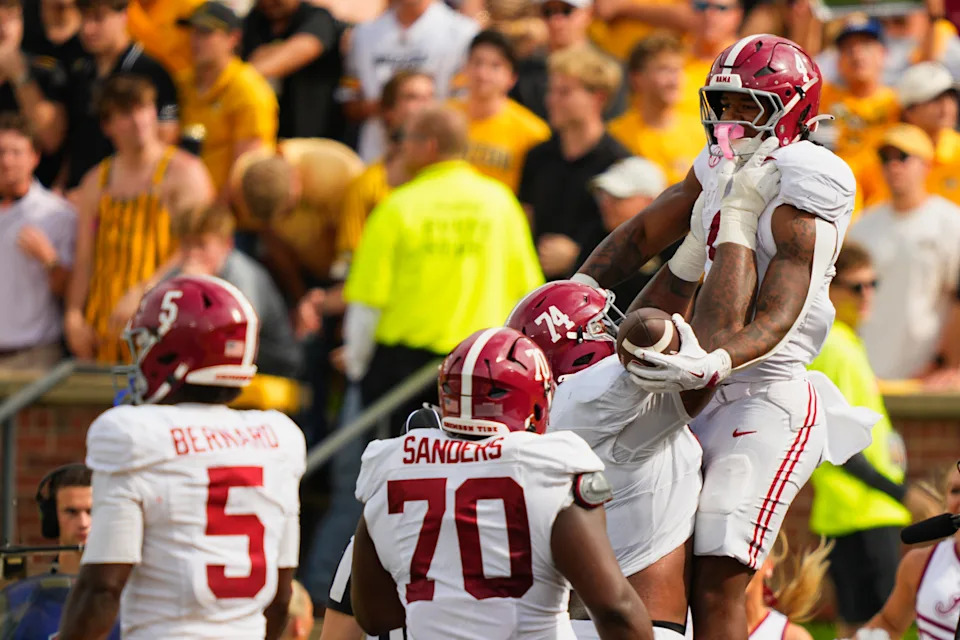 Oct 11, 2025; Columbia, Missouri, USA; Alabama Crimson Tide running back Daniel Hill (4) celebrates his touchdown against the Missouri Tigers during the second half of the game at Faurot Field at Memorial Stadium. Mandatory Credit: Jay Biggerstaff-Imagn Images