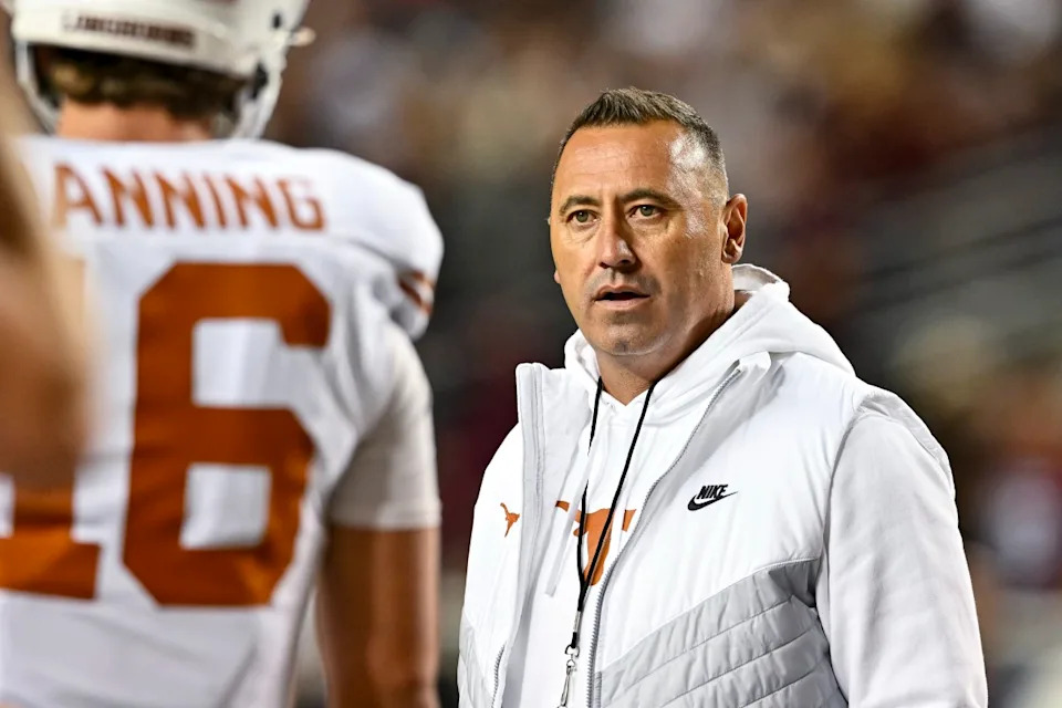 Texas Longhorns head coach Steve Sarkisian and quarterback Arch Manning (16).Maria Lysaker-Imagn Images