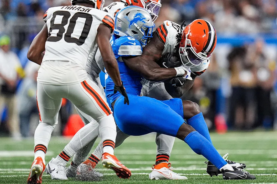 Detroit Lions cornerback Terrion Arnold (6) tackles Cleveland Browns running back Quinshon Judkins (10) during the second half at Ford Field in Detroit on Sunday, Sept. 28, 2025.
